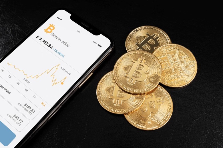 Illustration of Bitcoin and a mobile screen showing a price chart